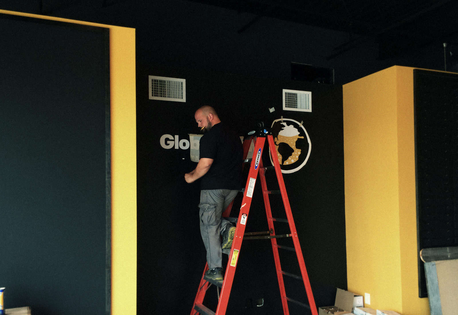 Global Brew Logo Application on Wall