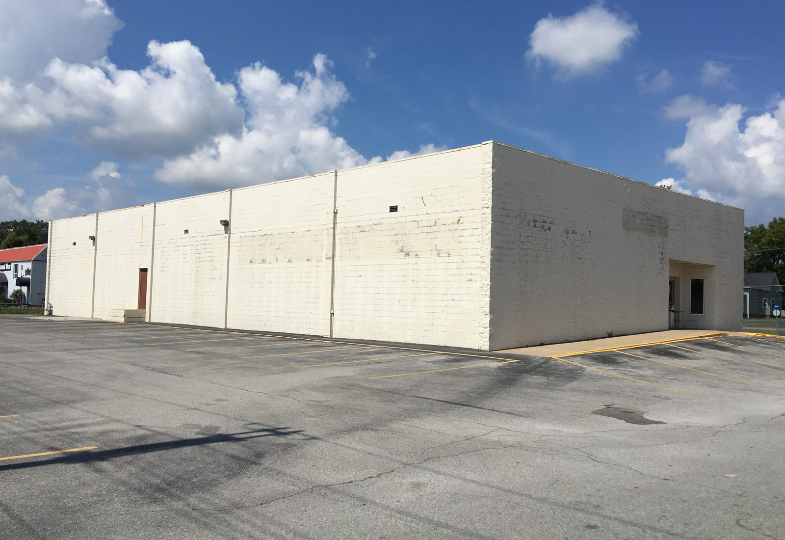 Luckys Liquors Building Before Remodel & Store Design
