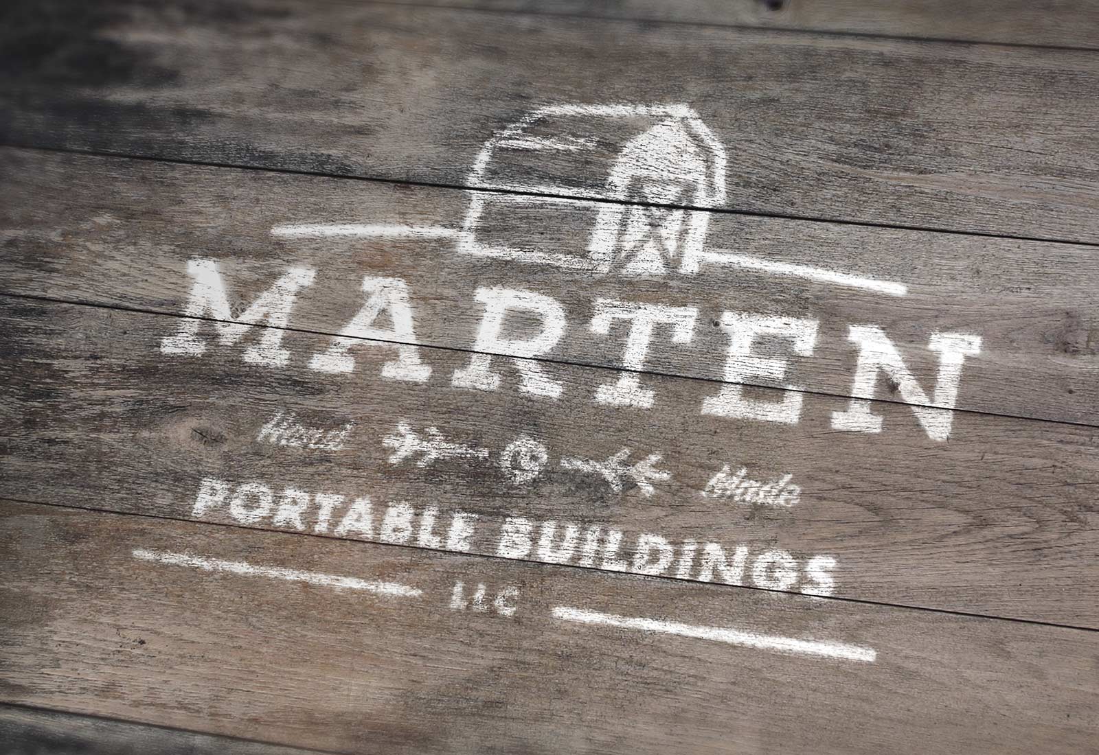 Marten Portable Buildings Logo Painted On Wood